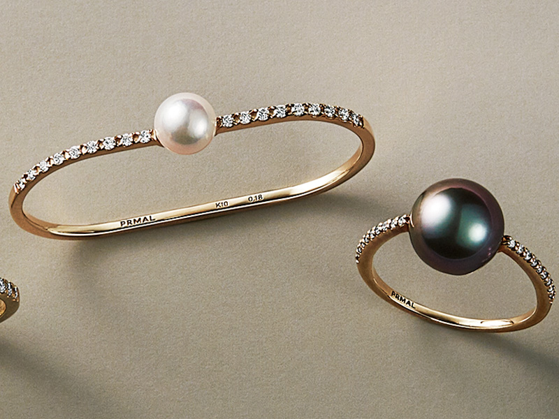 プライマルのパールにダイヤがついたダブルフィンガーリングとブラックパールにダイヤがついたリング