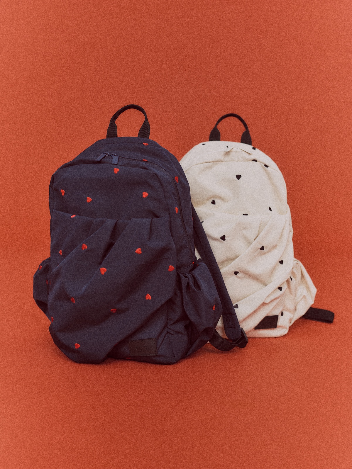 emmiのHEART IN DAILYシリーズのボディバッグ