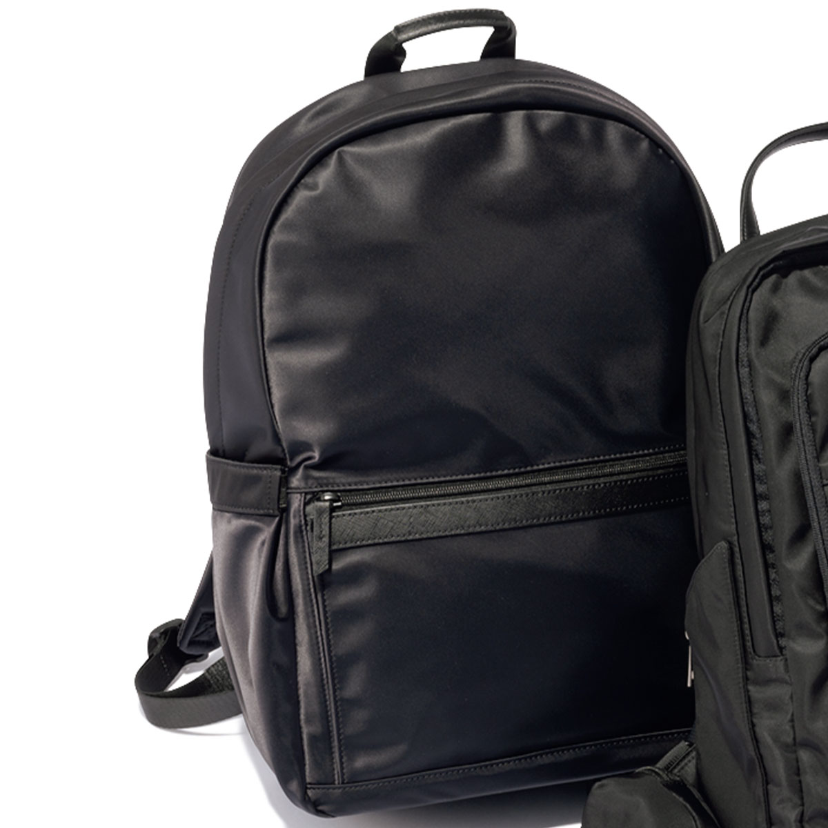洋服の青山の黒リュック